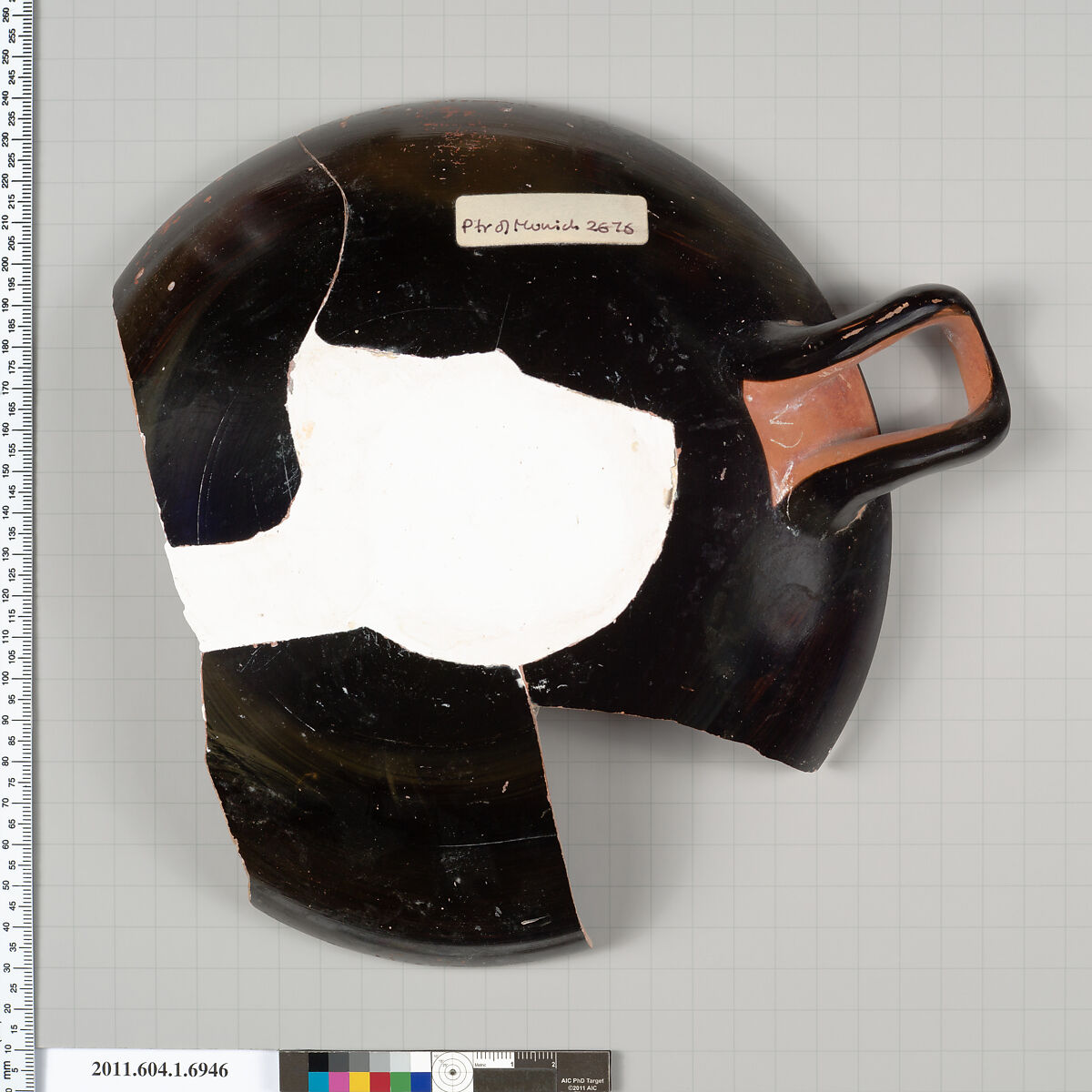 Terracotta fragment of a kylix (drinking cup), Attributed to the Painter of Munich 2676 [DvB], Terracotta, Greek, Attic