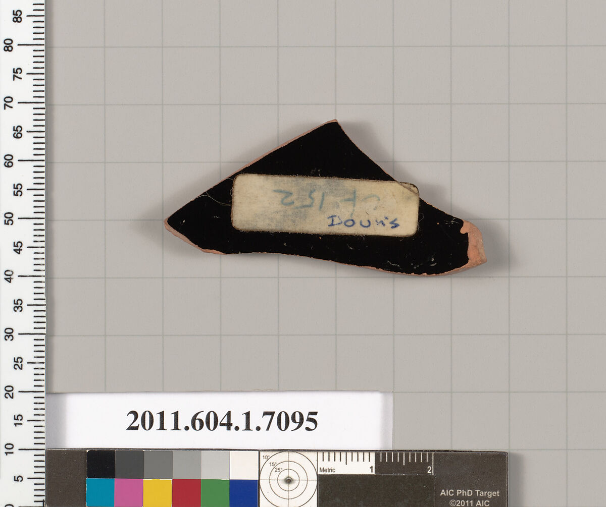 Terracotta fragment of a kylix (drinking cup), Attributed to Douris [DvB], Terracotta, Greek, Attic
