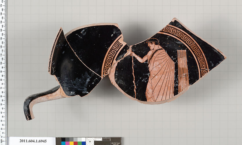 Terracotta fragment of a kylix (drinking cup)