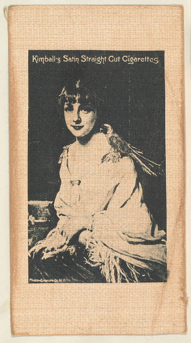 Seated woman with bird on shoulder (on brown silk), from the Girl Art Subjects series (N193) issued by Wm. S. Kimball & Co., Issued by William S. Kimball &amp; Company, Commercial lithograph printed on silk 