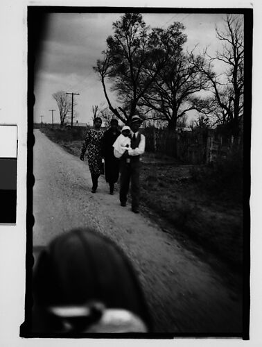 [People Walking by Side of Road, From Moving Automobile, New Orleans Vicinity, Louisiana]