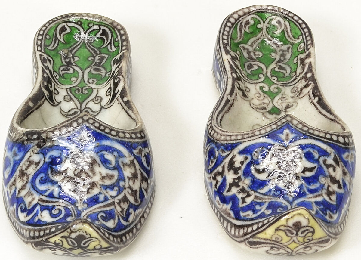 Pair of Qajar Ceramic Slippers, Stonepaste; underglaze painted under transparent glaze