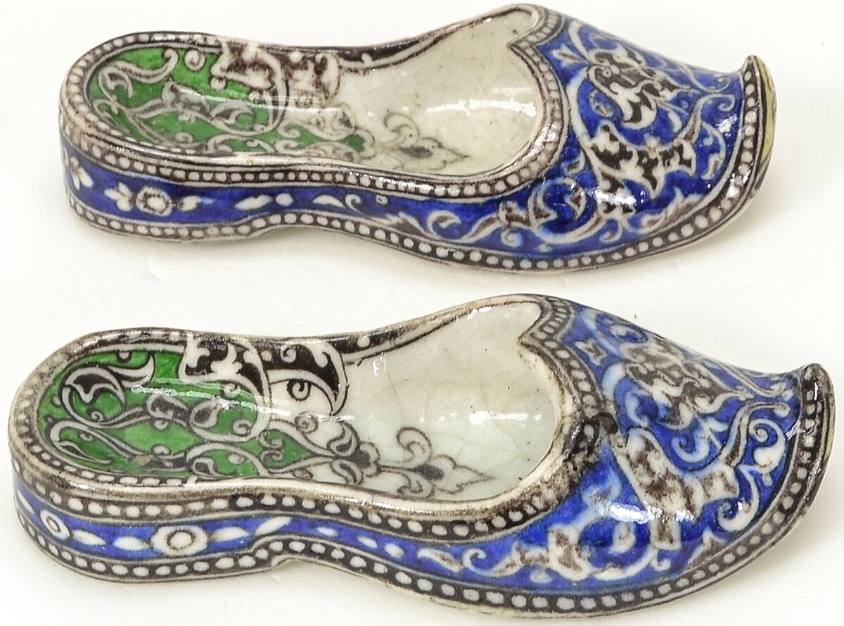 Pair of Qajar Ceramic Slippers, Stonepaste; underglaze painted under transparent glaze