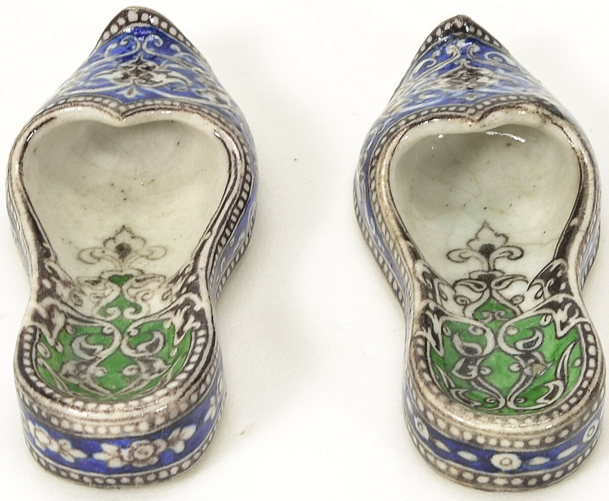 Pair of Qajar Ceramic Slippers, Stonepaste; underglaze painted under transparent glaze
