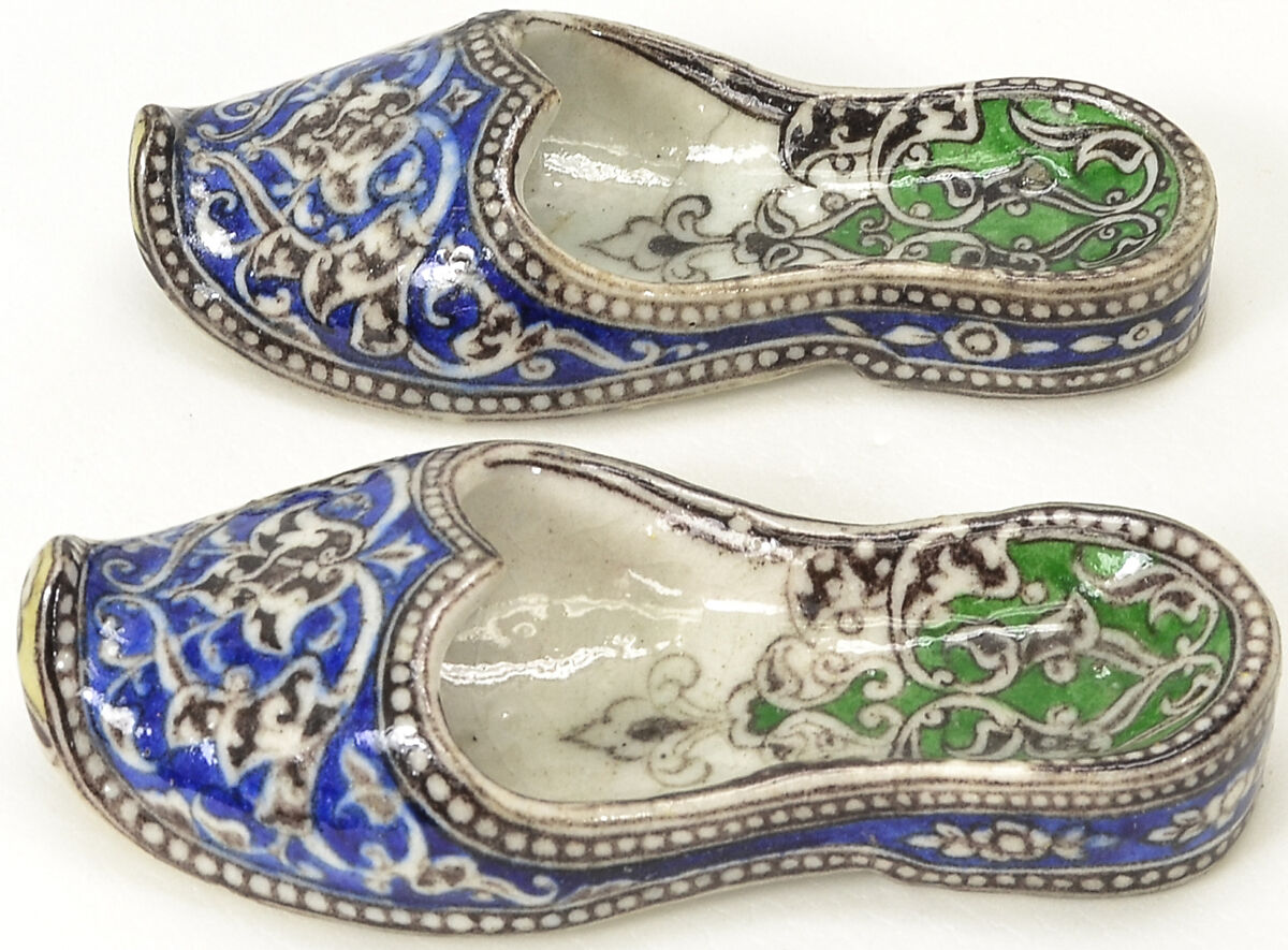 Pair of Qajar Ceramic Slippers, Stonepaste; underglaze painted under transparent glaze