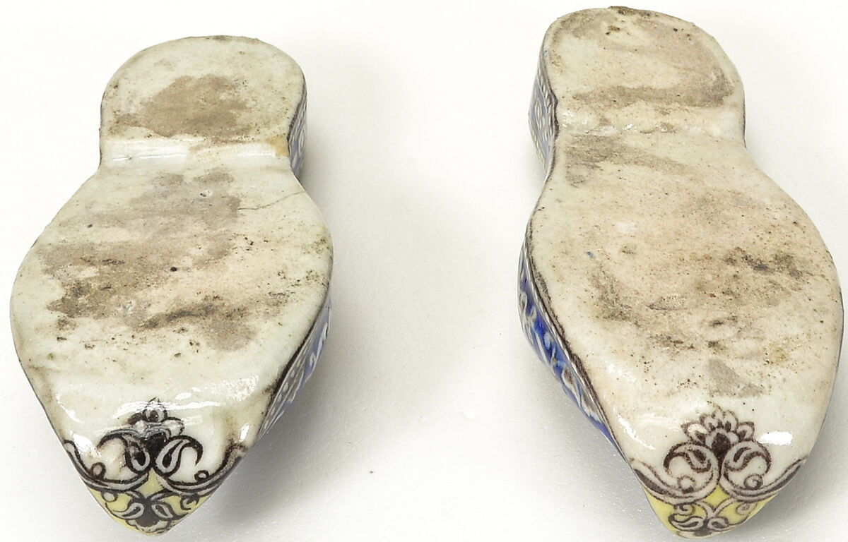 Pair of Qajar Ceramic Slippers, Stonepaste; underglaze painted under transparent glaze