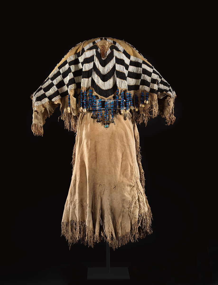 Dress and belt with awl case, Dress: tanned leather, glass beads, shell, bone, elk teeth, and brass thimbles
belt: commercial leather, glass beads, and metal studs
awl case: tanned leather, and glass beads, Wasco, Native American