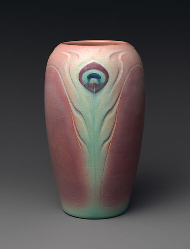Vase with peacock feathers