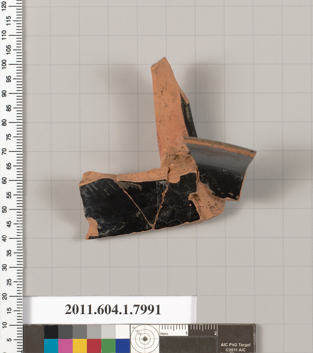 Terracotta fragment of a kylix (drinking cup), Terracotta, Greek, Attic