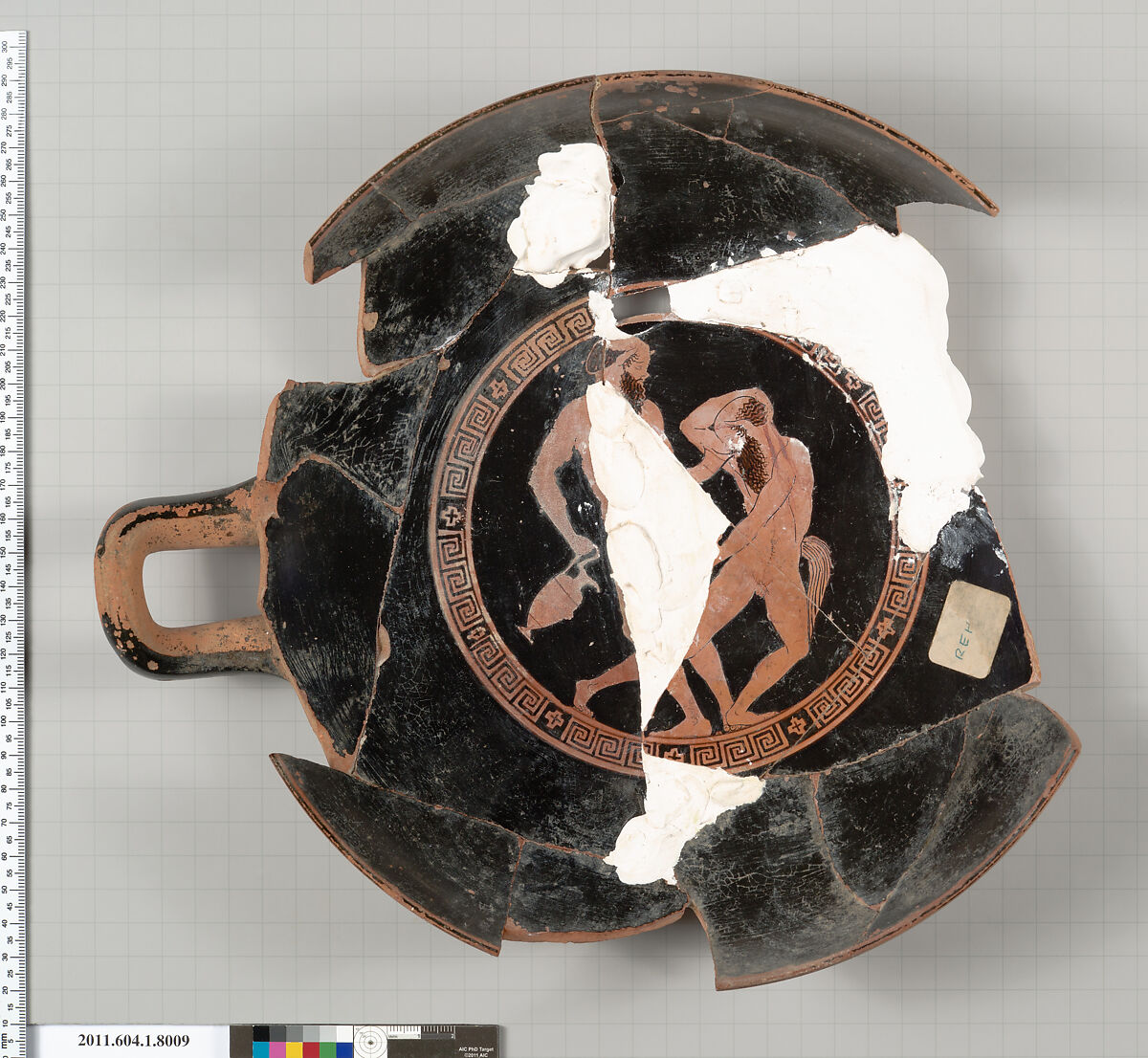 Terracotta fragment of a kylix (drinking cup), Terracotta, Greek, Attic