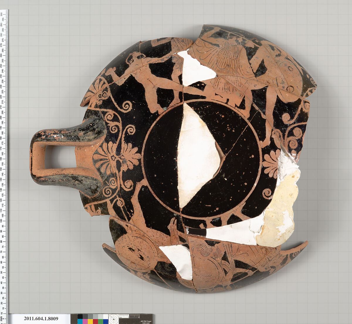 Terracotta fragment of a kylix (drinking cup), Terracotta, Greek, Attic