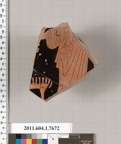 Terracotta fragment of a kylix (drinking cup)