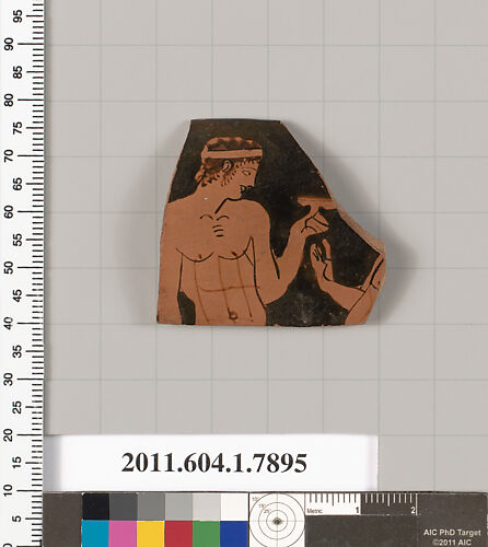 Terracotta rim fragment of a kylix (drinking cup)