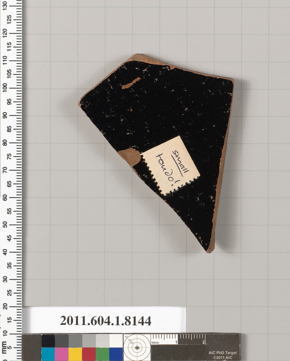 Terracotta fragment of a kylix (drinking cup), Terracotta, Greek, Attic