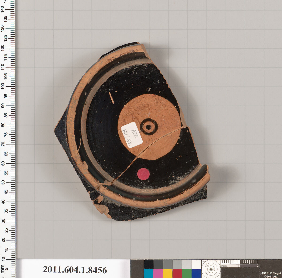 Terracotta fragment of a stemless kylix (drinking cup), Terracotta, Greek, Attic