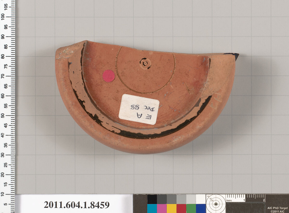 Terracotta fragment of a stemless kylix (drinking cup), Terracotta, Greek, Attic