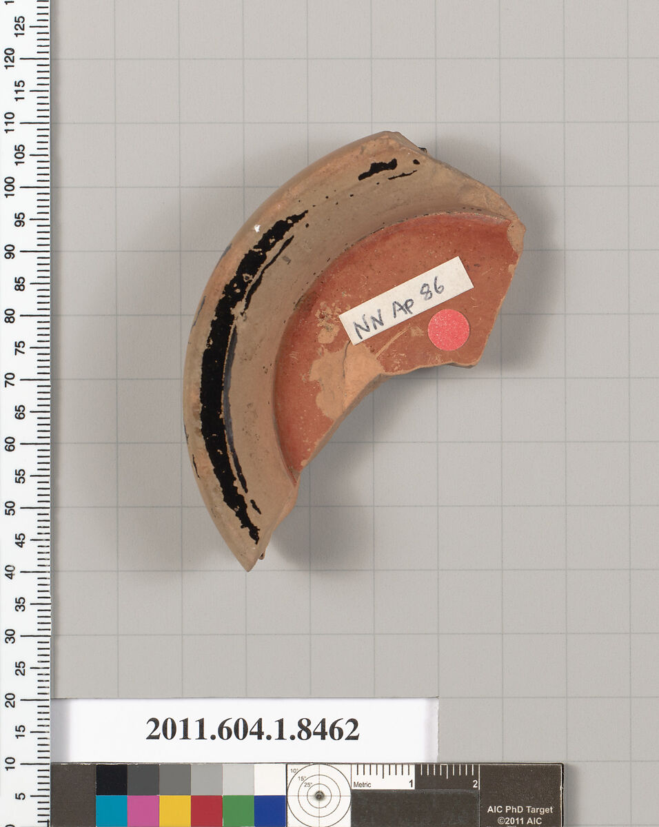 Terracotta fragment of a stemless kylix (drinking cup), Terracotta, Greek, Attic