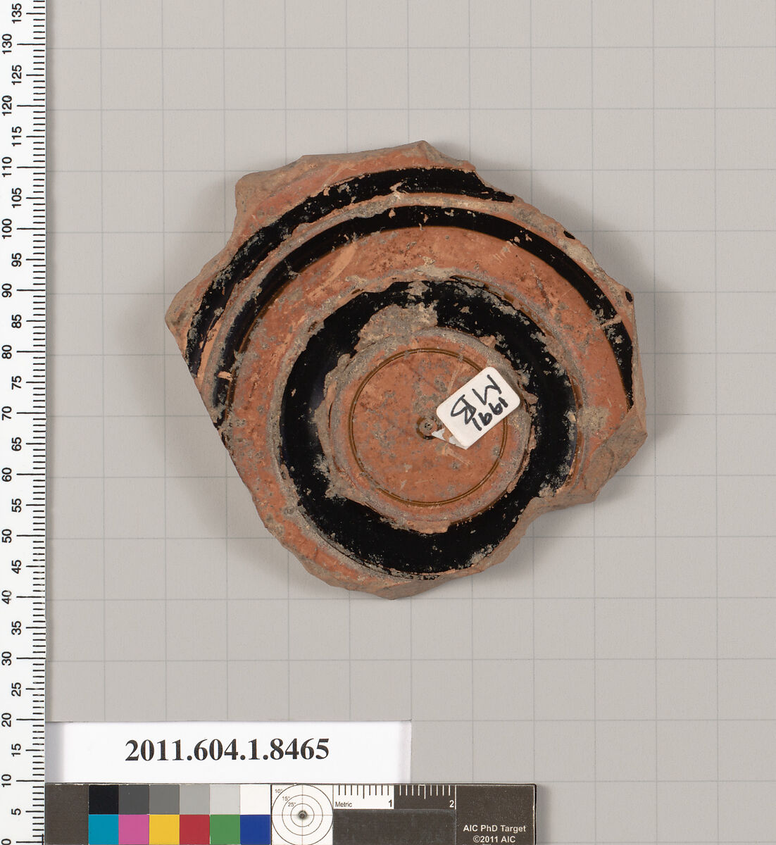 Terracotta fragment of a stemless kylix (drinking cup), Terracotta, Greek, Attic