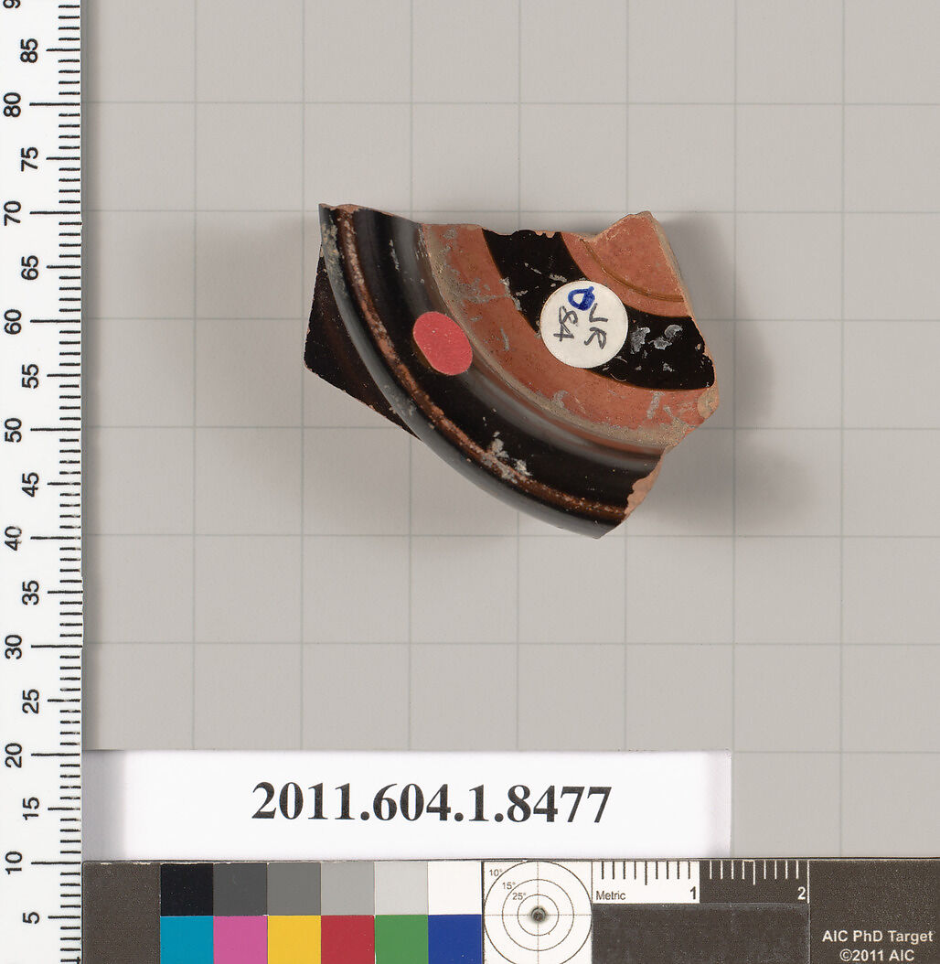 Terracotta fragment of a stemless kylix (drinking cup), Terracotta, Greek, Attic