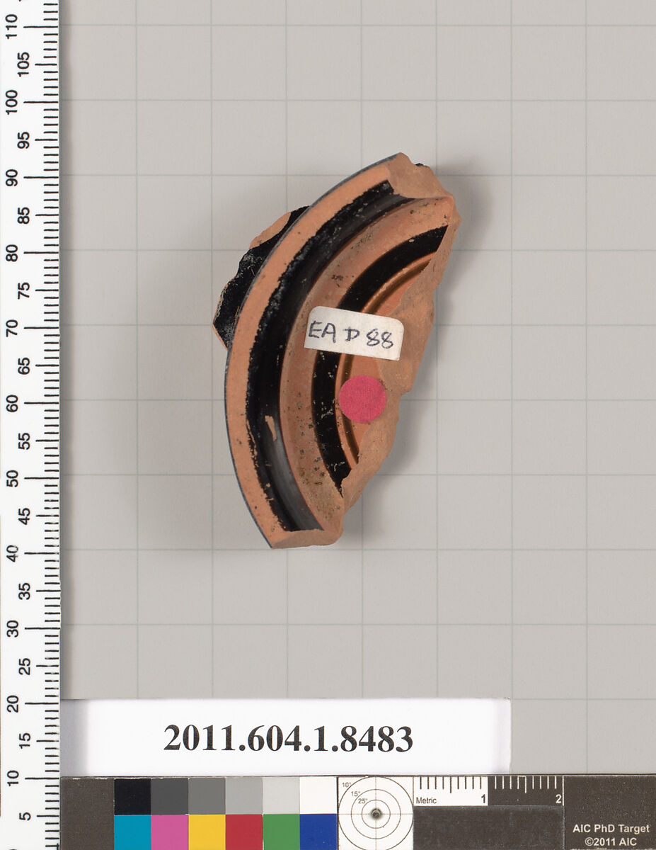 Terracotta fragment of a stemless kylix (drinking cup), Terracotta, Greek, Attic