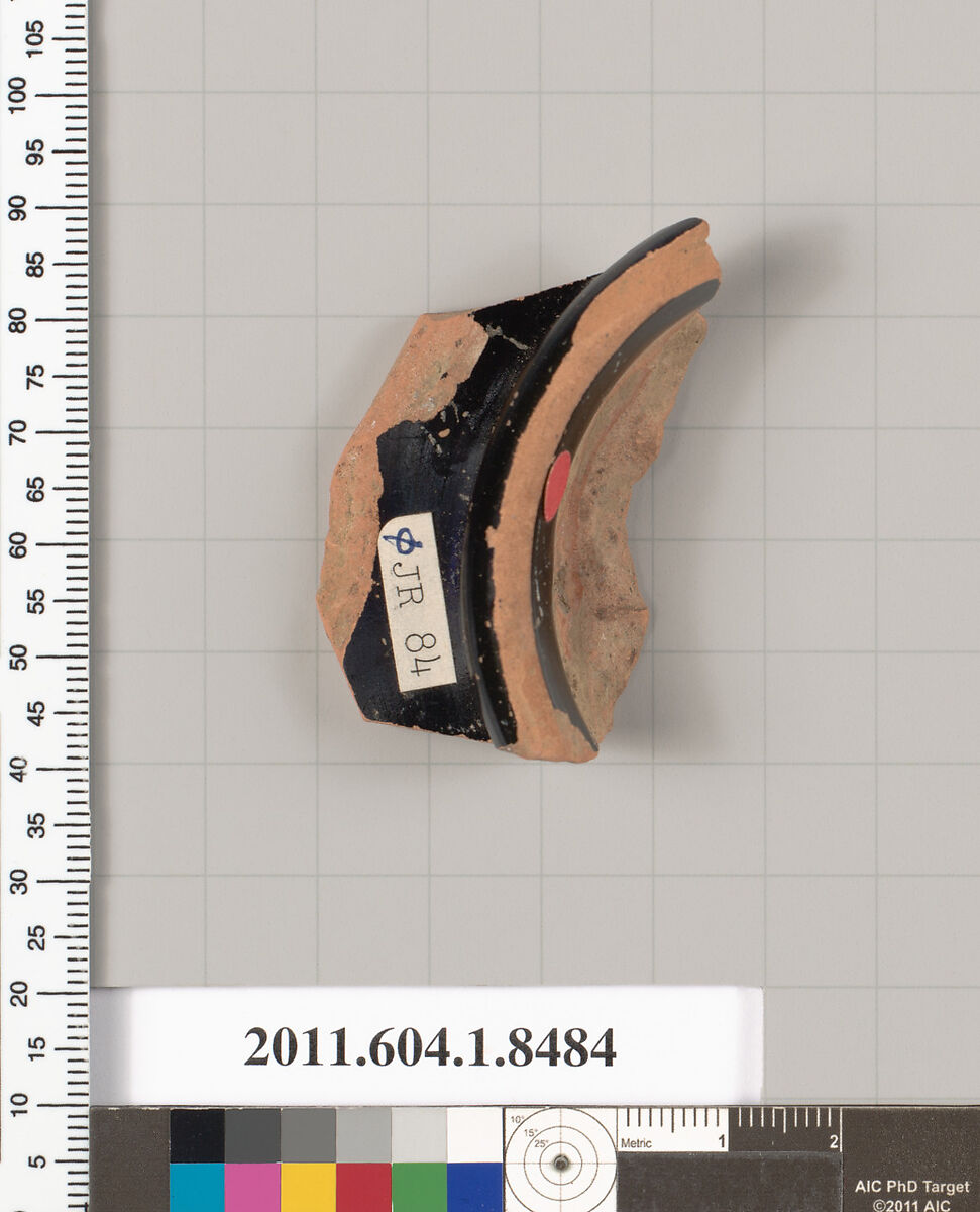 Terracotta fragment of a stemless kylix (drinking cup), Terracotta, Greek, Attic