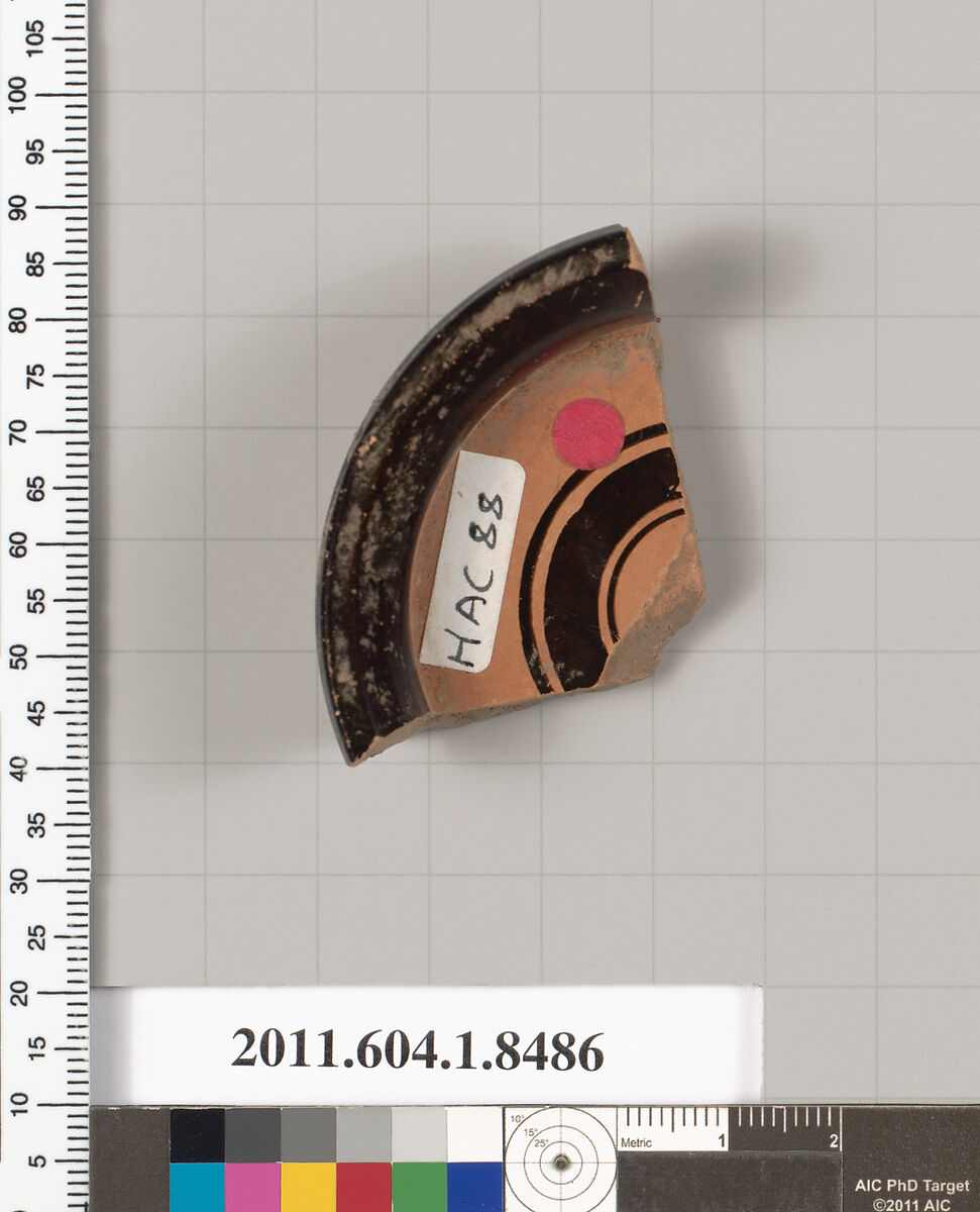 Terracotta fragment of a stemless kylix (drinking cup), Terracotta, Greek, Attic