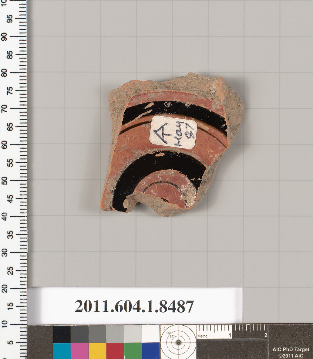 Terracotta fragment of a stemless kylix (drinking cup), Terracotta, Greek, Attic