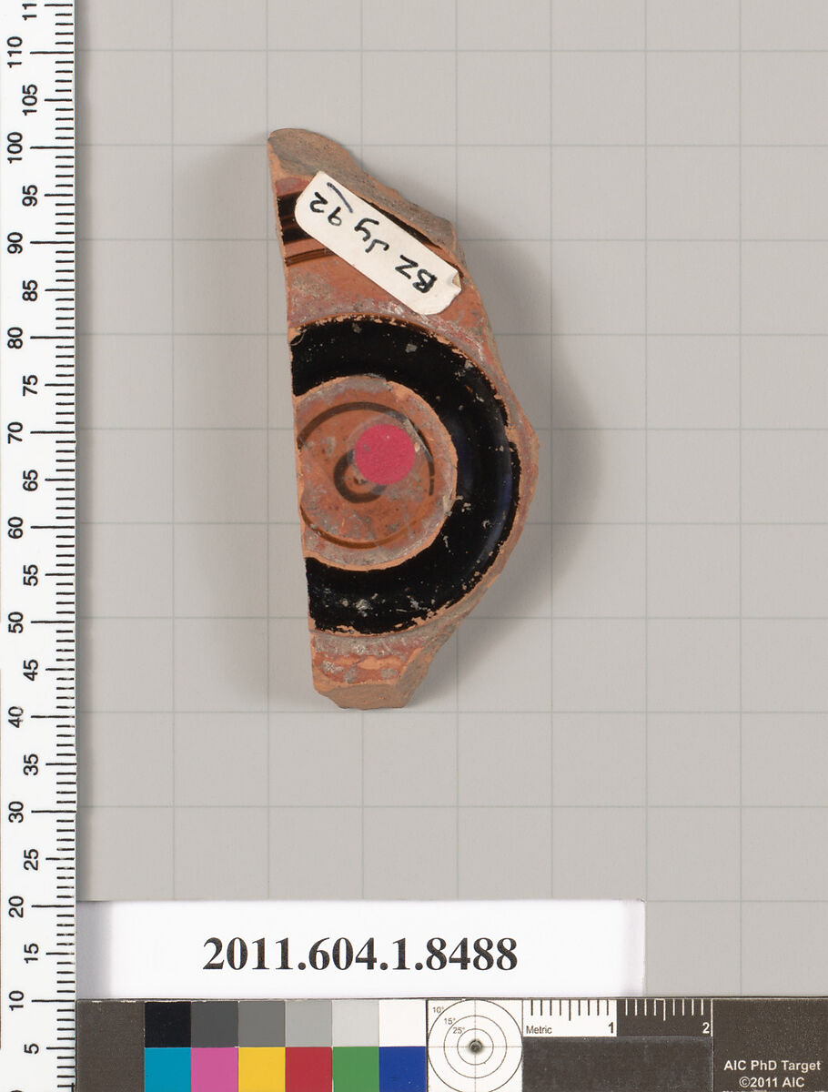 Terracotta fragment of a stemless kylix (drinking cup), Terracotta, Greek, Attic