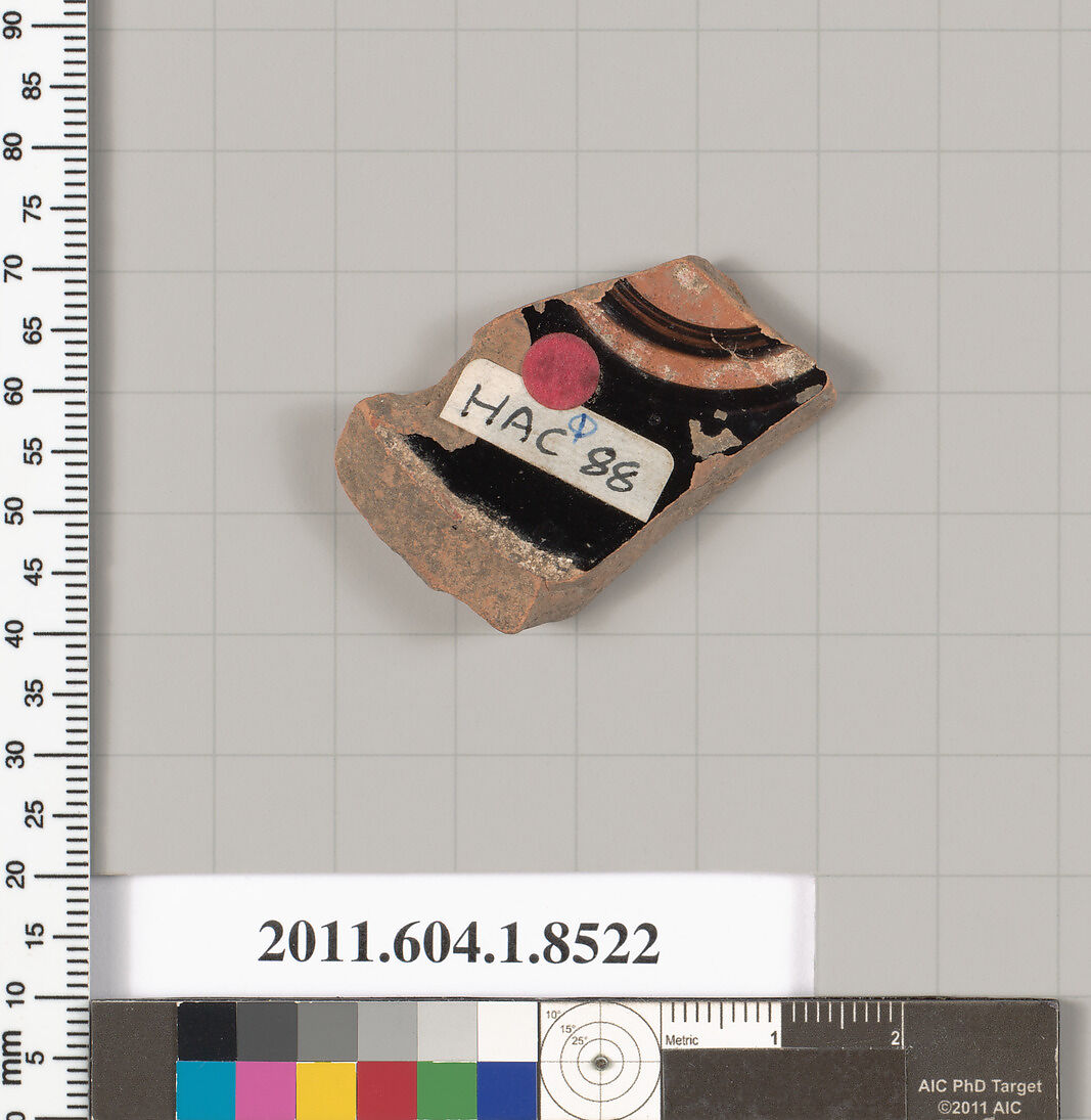 Terracotta fragment of a stemless kylix (drinking cup), Terracotta, Greek, Attic