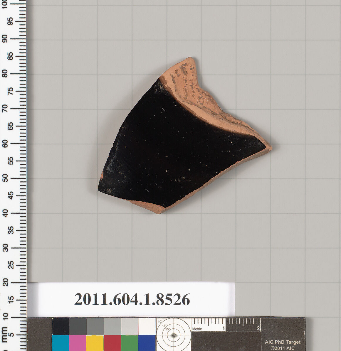 Terracotta fragment of a stemless kylix (drinking cup), Terracotta, Greek, Attic