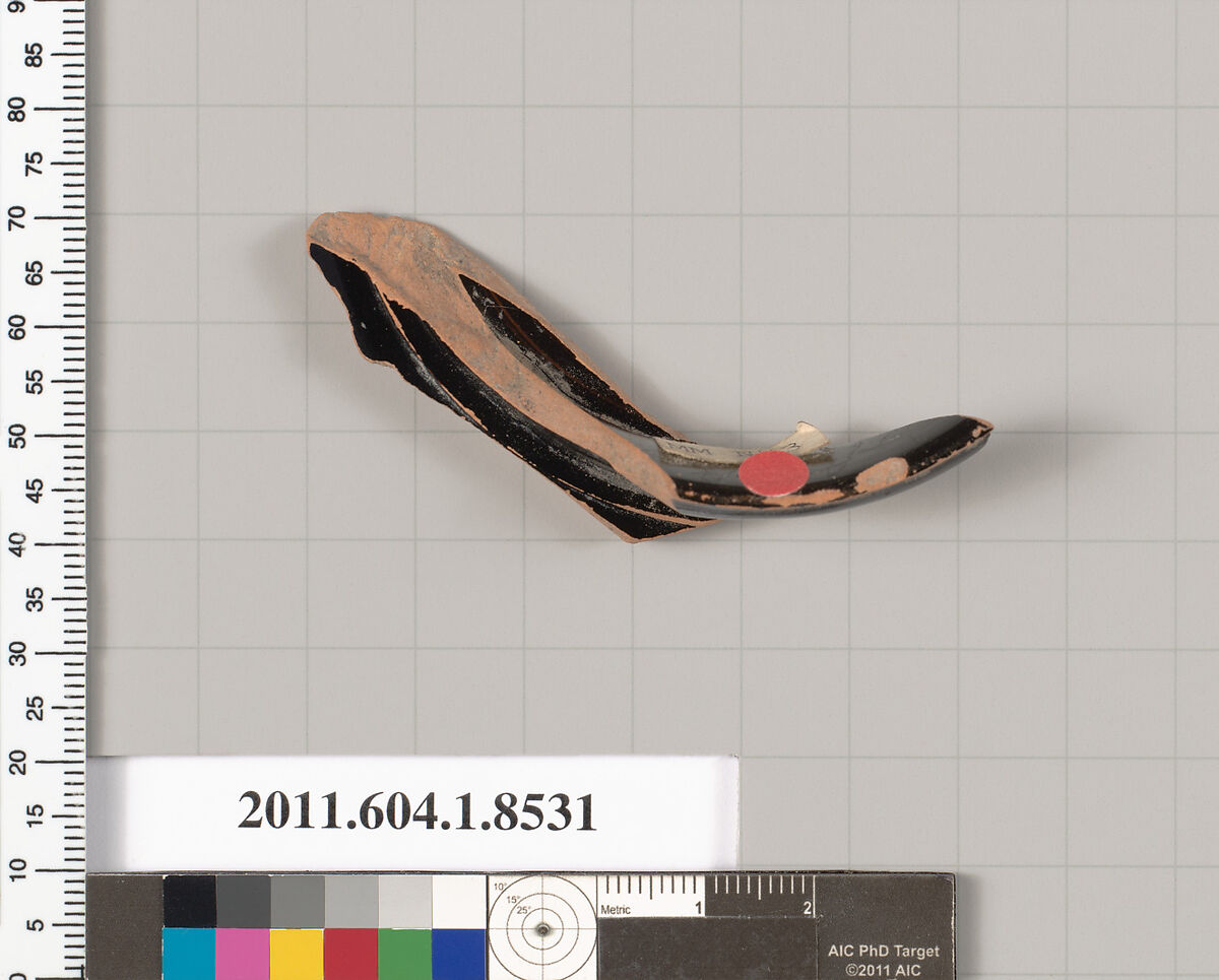 Terracotta fragment of a stemless kylix (drinking cup), Terracotta, Greek, Attic