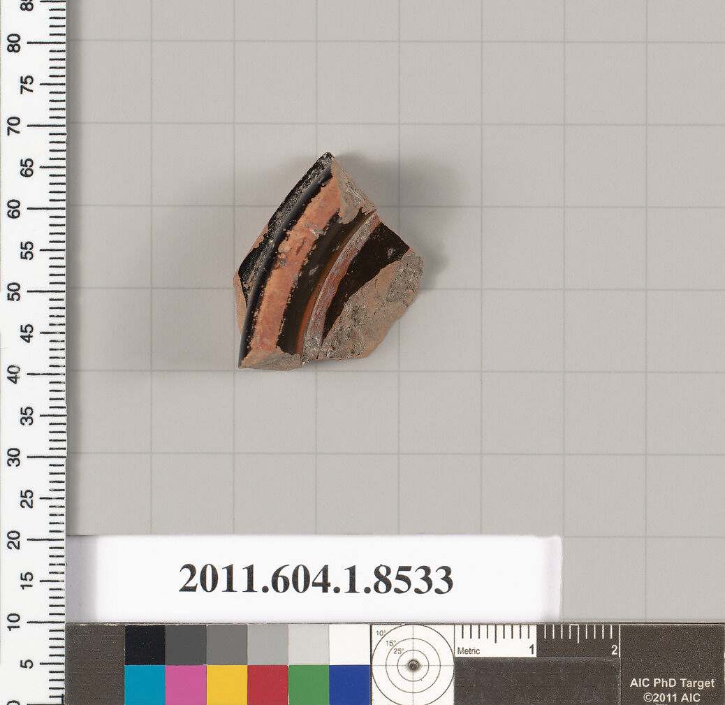 Terracotta fragment of a stemless kylix (drinking cup), Terracotta, Greek, Attic