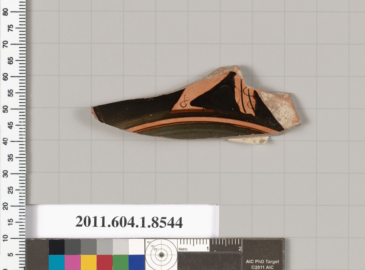 Terracotta fragment of a stemless kylix (drinking cup), Terracotta, Greek, Attic