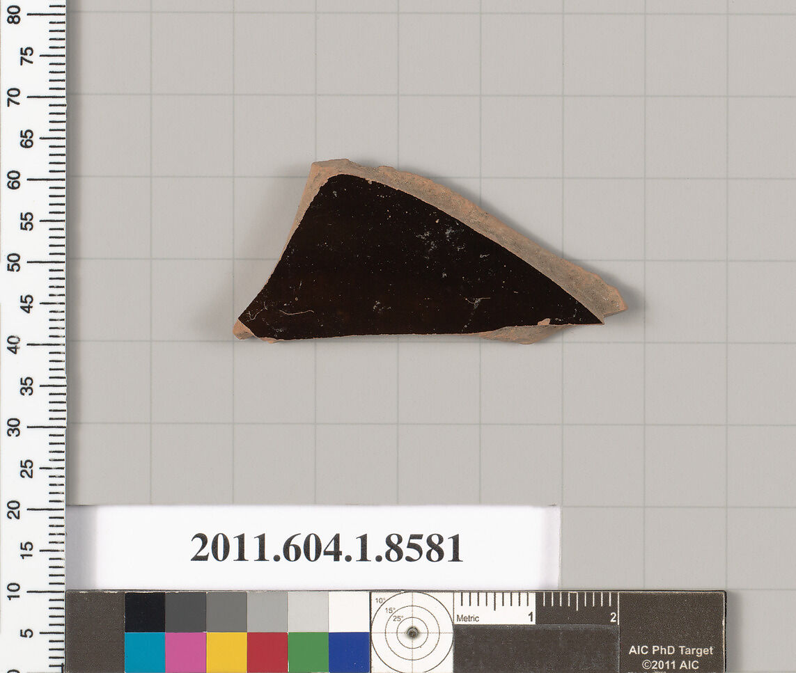 Terracotta fragment of a stemless kylix (drinking cup), Terracotta, Greek, Attic