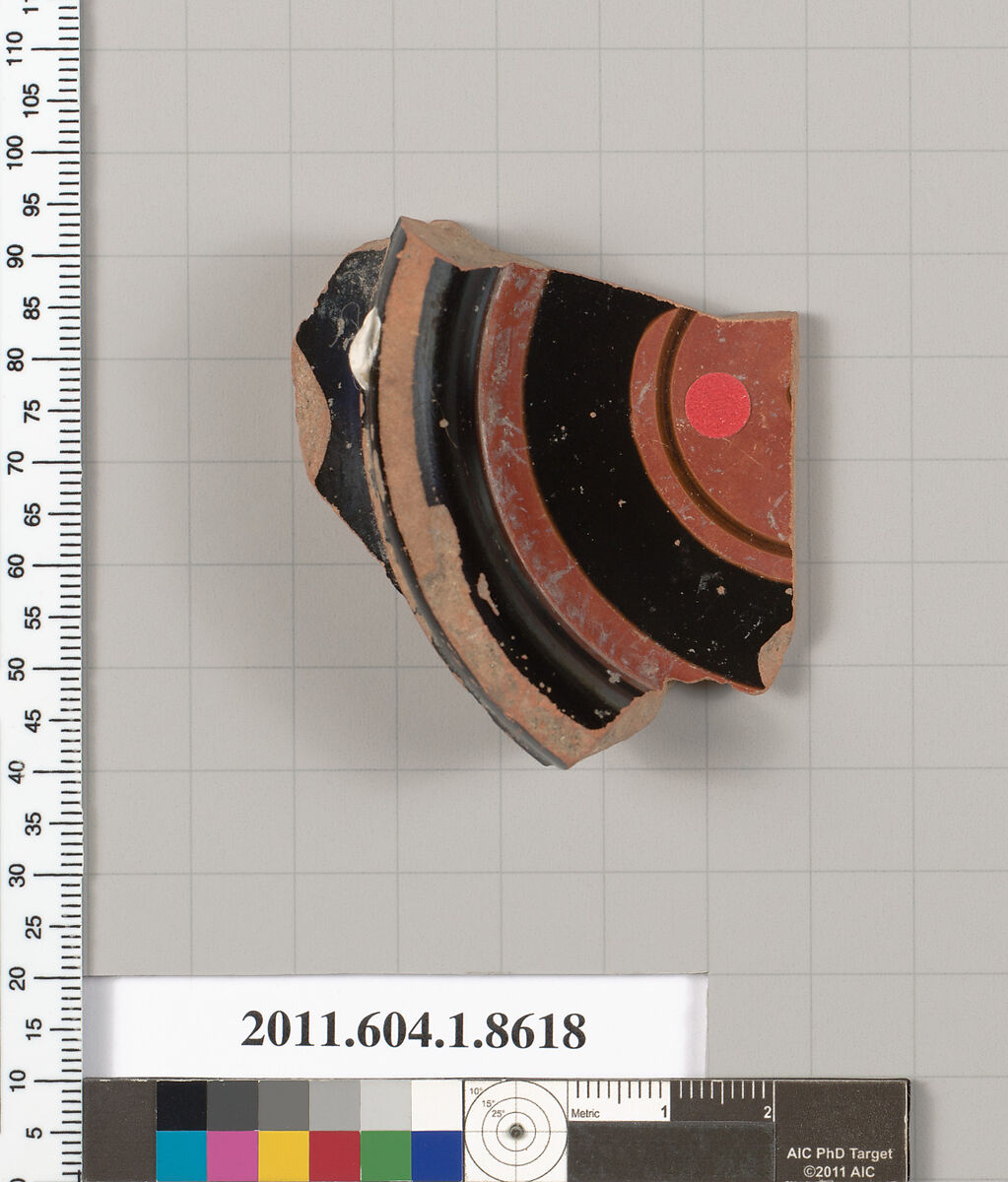 Terracotta fragment of a stemless kylix (drinking cup), Terracotta, Greek, Attic