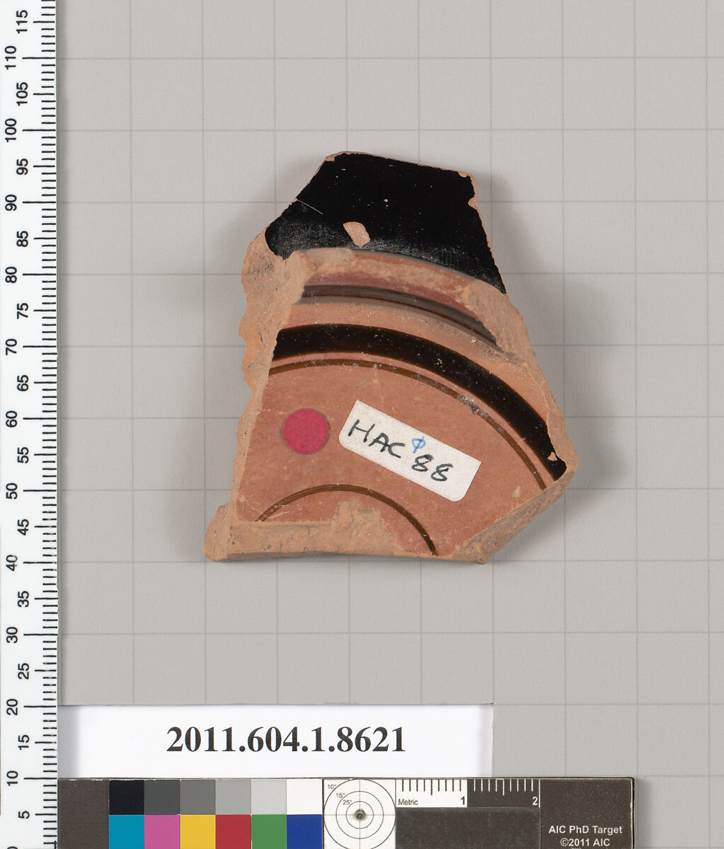 Terracotta fragment of a stemless kylix (drinking cup), Terracotta, Greek, Attic