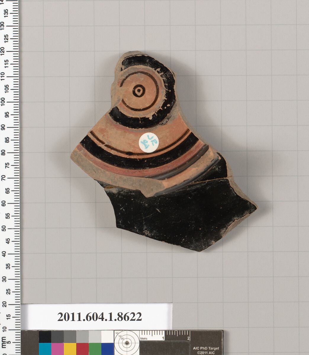 Terracotta fragment of a stemless kylix (drinking cup), Terracotta, Greek, Attic