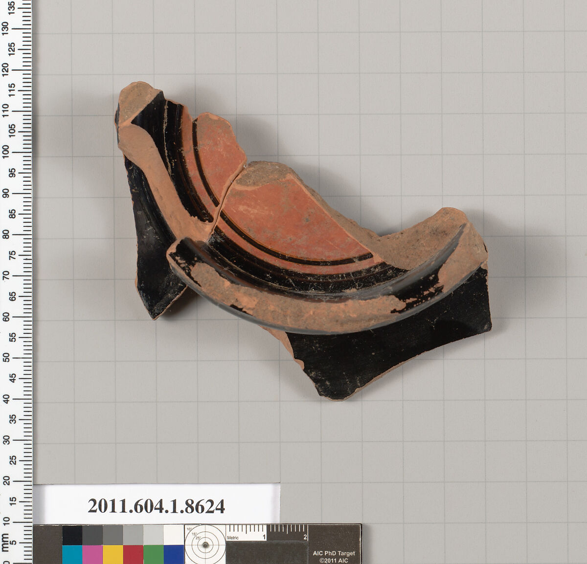 Terracotta fragment of a stemless kylix (drinking cup), Terracotta, Greek, Attic