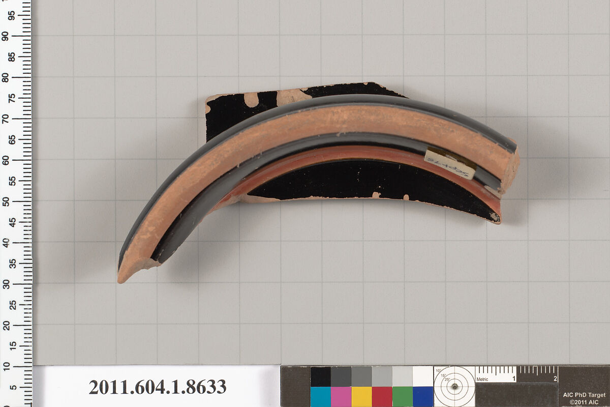 Terracotta fragment of a stemless kylix (drinking cup), Terracotta, Greek, Attic