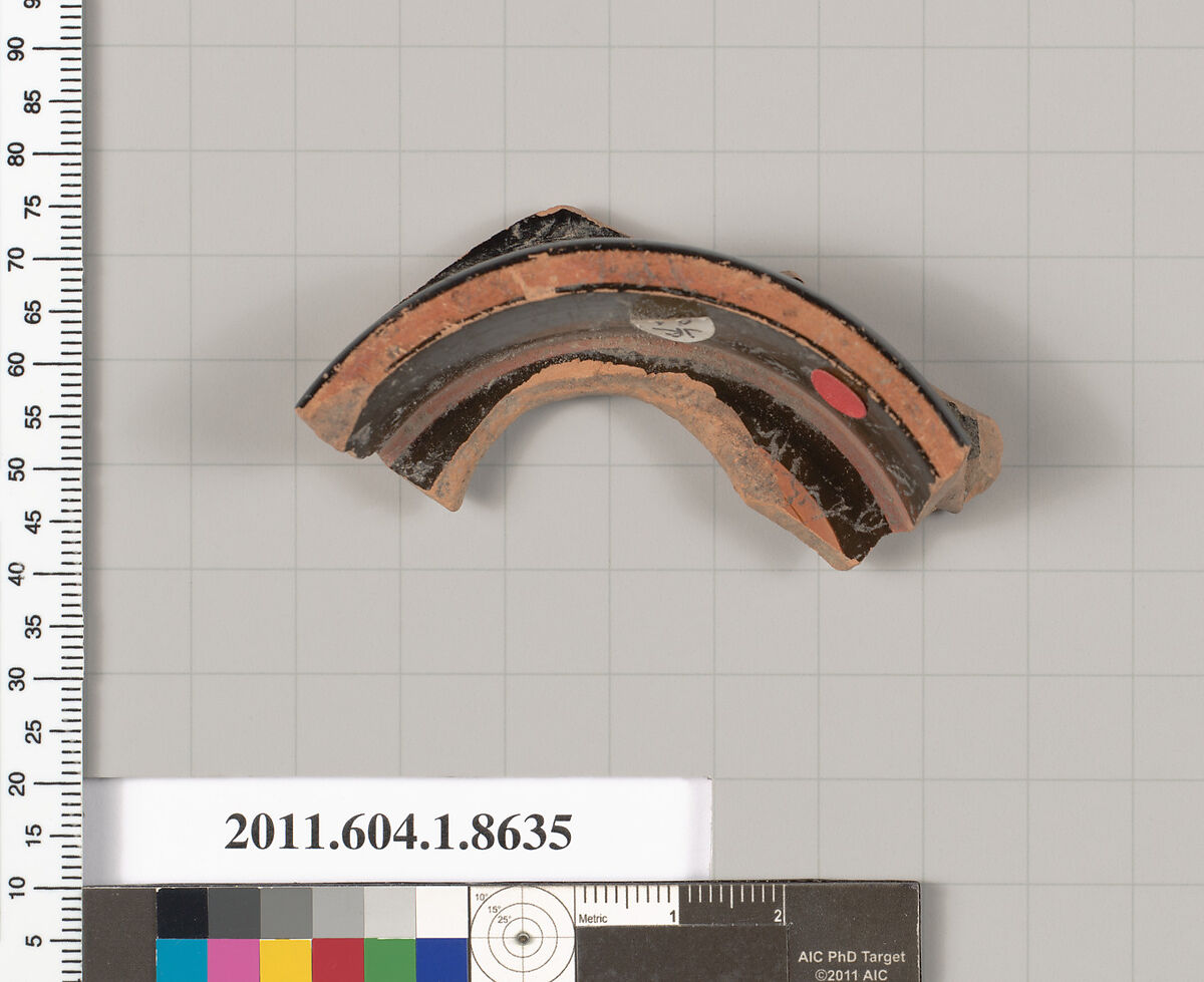 Terracotta fragment of a stemless kylix (drinking cup), Terracotta, Greek, Attic