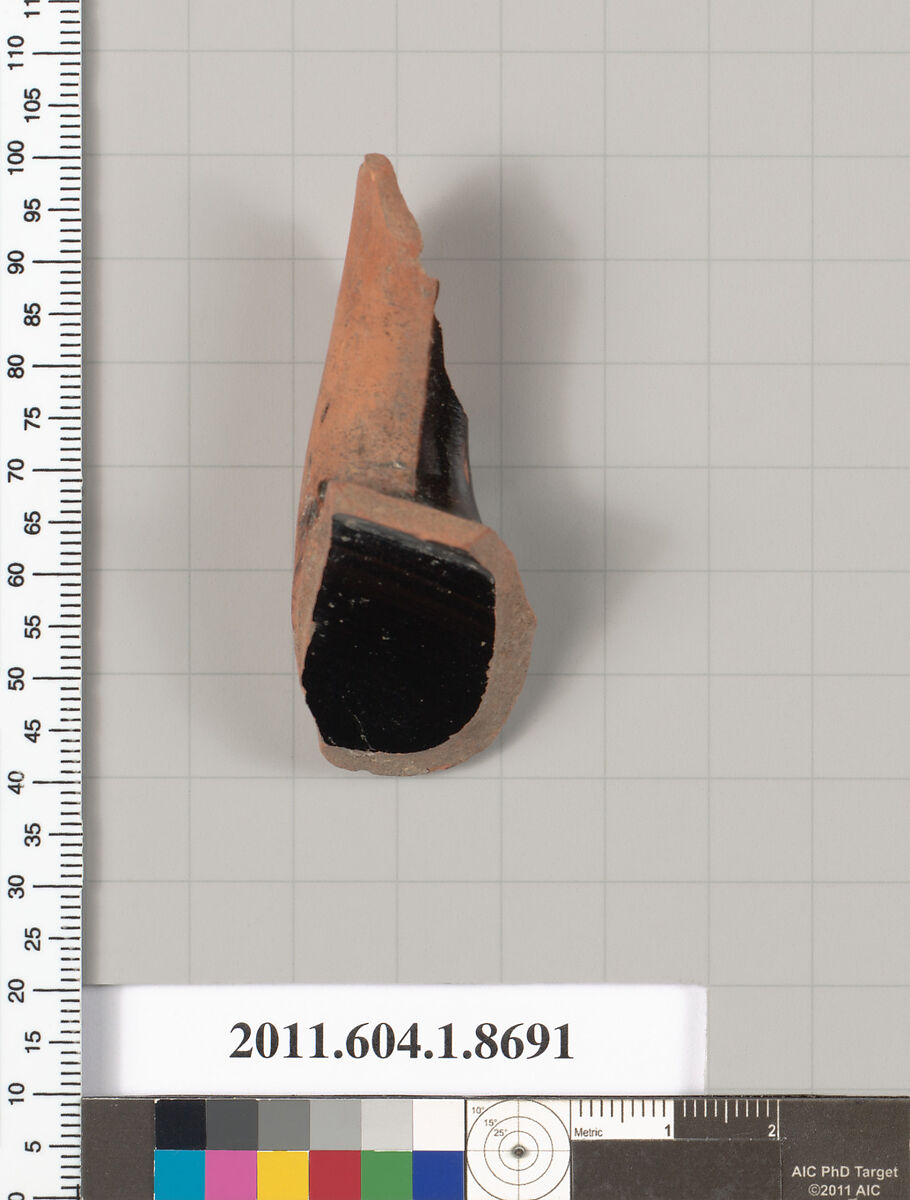 Terracotta fragment of a stemless kylix (drinking cup), Terracotta, Greek, Attic
