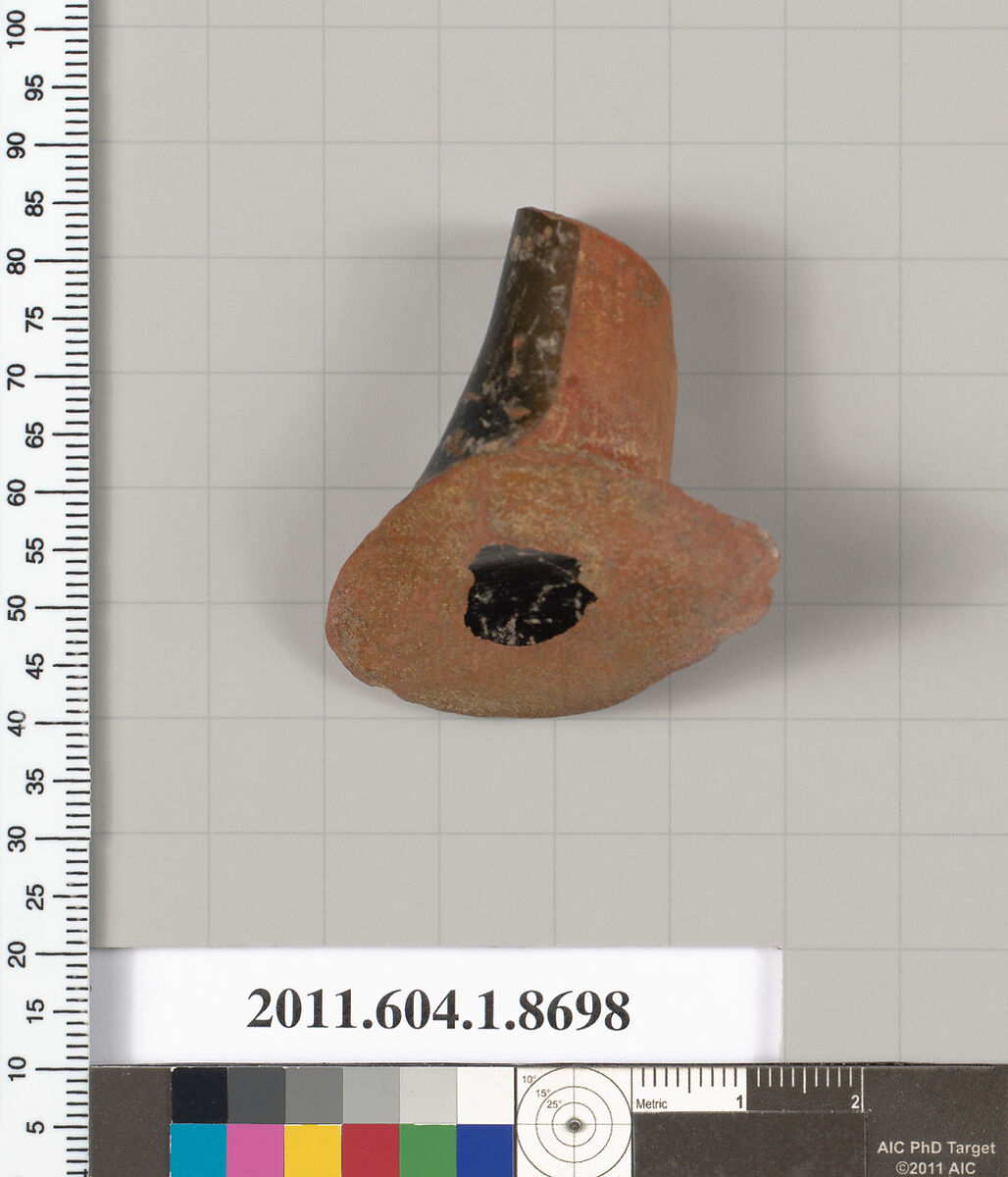 Terracotta fragment of a stemless kylix (drinking cup), Terracotta, Greek, Attic