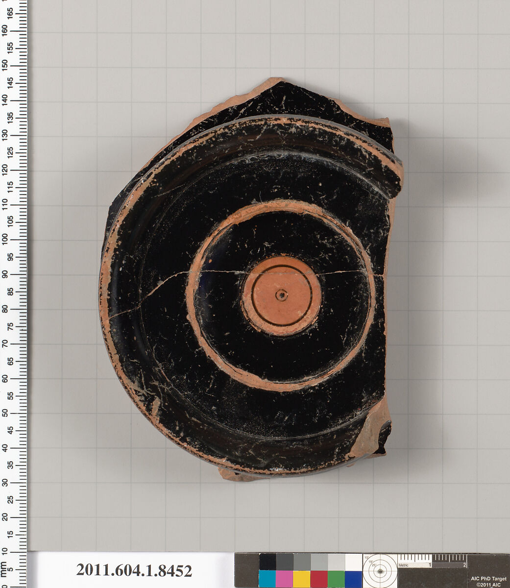 Terracotta fragment of a stemless kylix (drinking cup), Terracotta, Greek, Attic