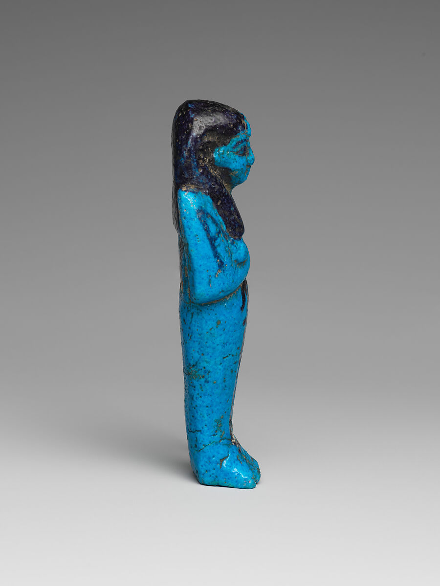 Shabti of the Adoratrice of Hathor Henettawy, wife of Painedjem I, Faience