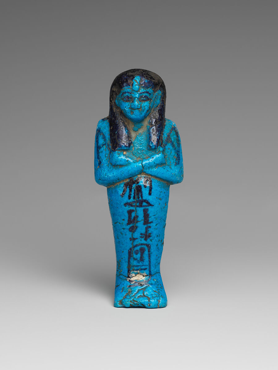 Shabti of the Adoratrice of Hathor Henettawy, wife of Painedjem I, Faience 