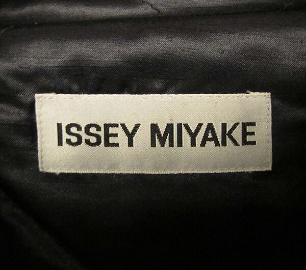 Coat, Issey Miyake (Japanese, 1938–2022), wool, silk, synthetic, leather, Japanese