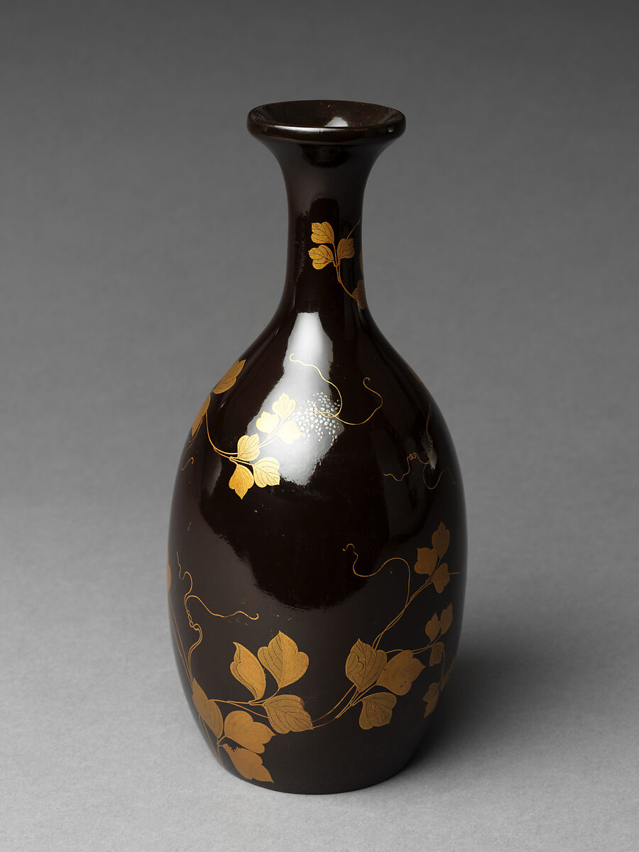 Sake bottle with grapevine decoration, Gold and silver makie on black lacquer, Japan