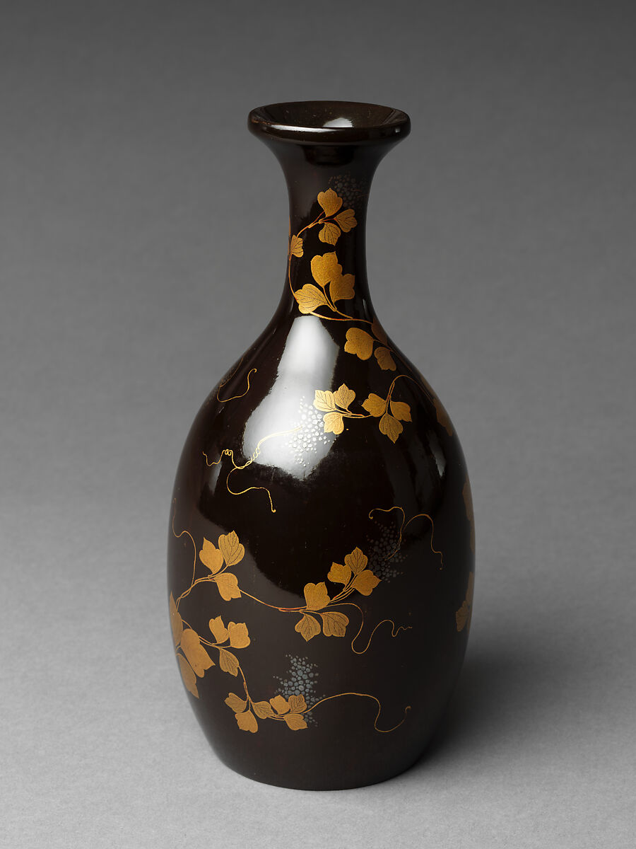 Sake bottle with grapevine decoration, Gold and silver makie on black lacquer, Japan 