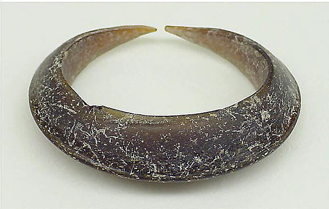 Large Closed Crescent-Shaped Earring, Translucent brown glass, Vietnam