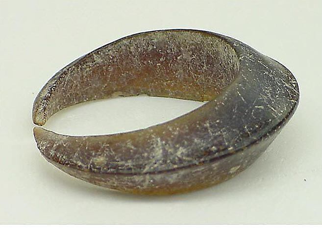 Large Closed Crescent-Shaped Earring, Translucent brown glass, Vietnam